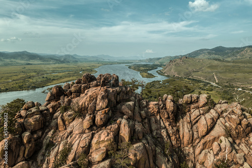 Rock on the background of the river