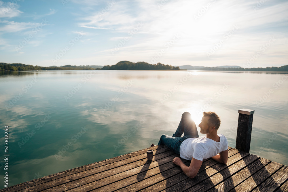 Mature man looking at scenic view from pier Mature man looking at scenic view from pier