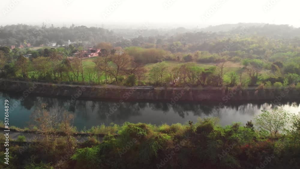 View of crystal clear water of Satluj River is flowing in the middle of greenery of Punjab area. View of crystal clear water of Satluj River is flowing in the middle of greenery of Punjab area.
