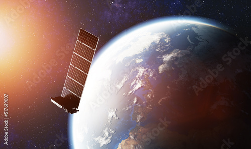 Fototapeta Naklejka Na Ścianę i Meble -  Internet starlink satellite in space near Earth.