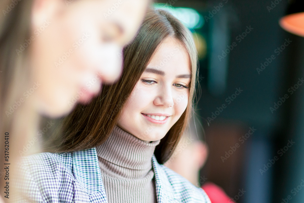 Cute girl smiling and looking down. Cute girl smiling and looking down.