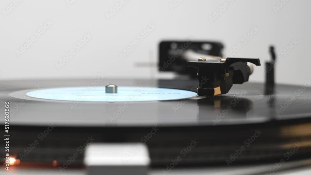 Close Up Of A Tone Arm And Spinning Vinyl Record And Its After Last Song Close Up Of A Tone Arm And Spinning Vinyl Record And Its After Last Song