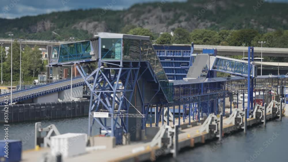 Passenger terminal in the Kristiansand port. A busy road in the background. Slow-motion, pan follow. Passenger terminal in the Kristiansand port. A busy road in the background. Slow-motion, pan follow.