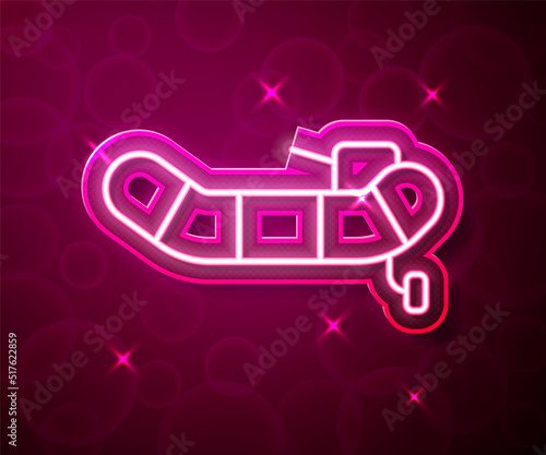 Glowing neon line Inflatable boat with outboard motor icon isolated on red background. Vector