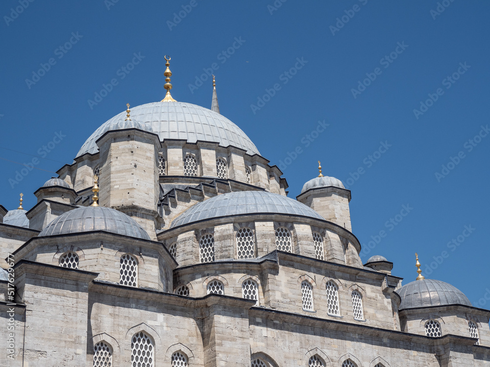 Fototapeta premium Mosque in Istanbul against blue sky