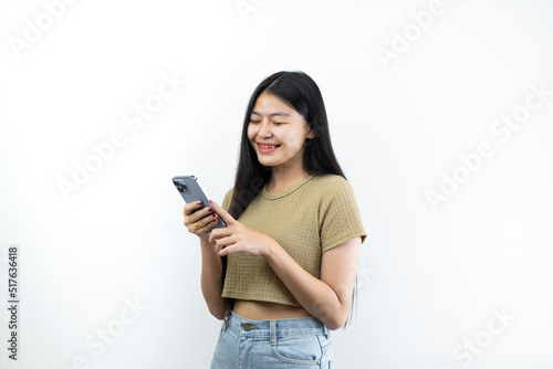 Young Asian teen woman showing smart phone isolated on white background.