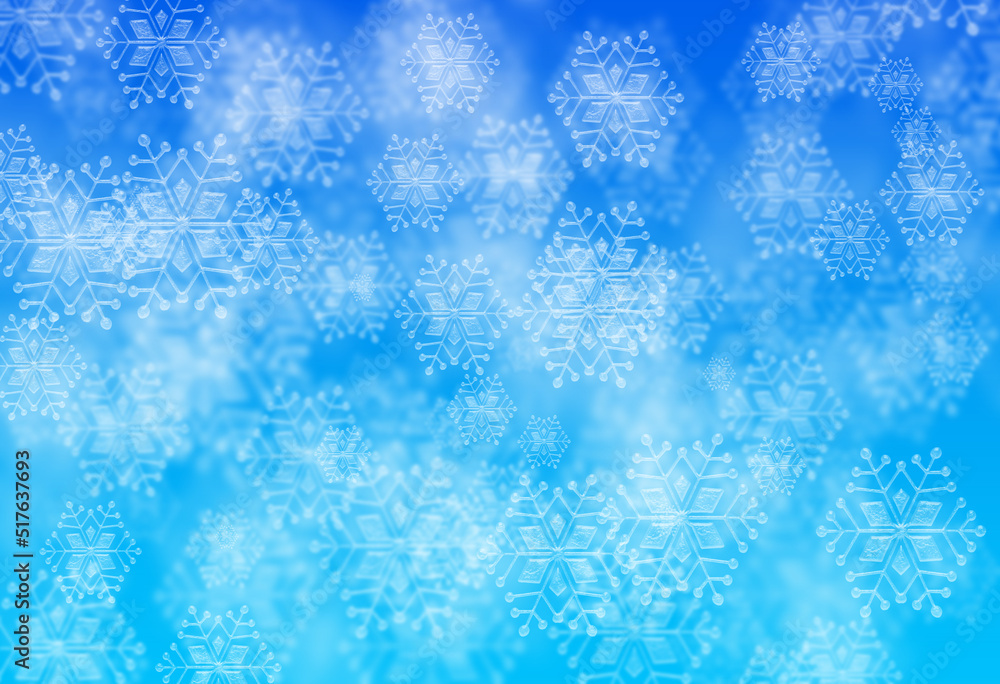 Digitally created image of Abstract blue snowflakes background.