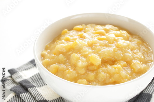 Sweetcorn paste in white bowl for cooking image 