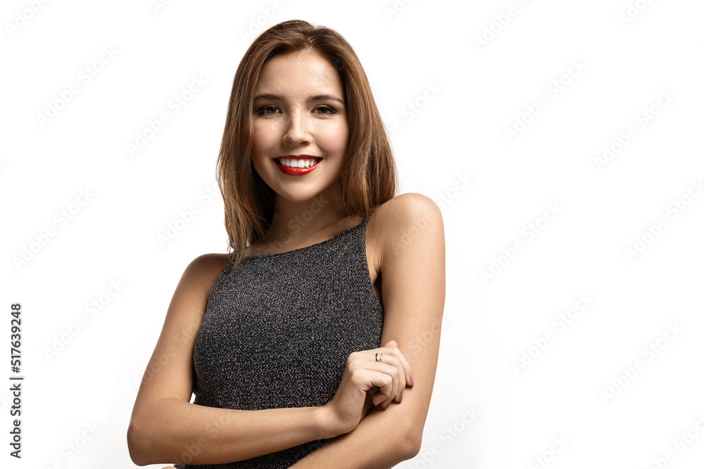 Portrait of smiling model with beautiful full lips and lovely makeup. Stylish lady in nice dress. Copy space in right side. Beauty concept. Isolated on white background Portrait of smiling model with beautiful full lips and lovely makeup. Stylish lady in nice dress. Copy space in right side. Beauty concept. Isolated on white background