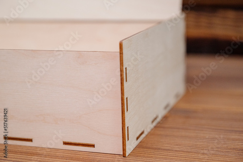 Wooden empty box on wooden background. Top view.