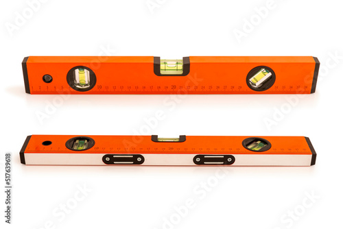 Obraz na płótnie Yellow building level or water level meter with a ruler isolated on white background