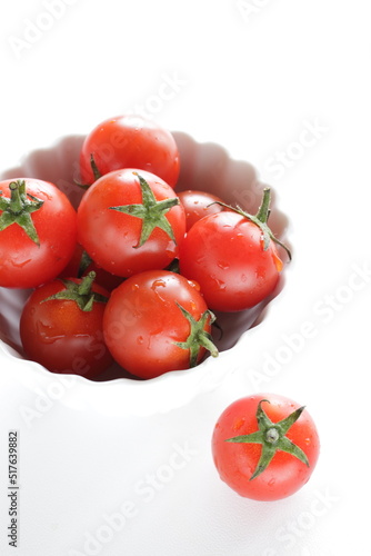 Freshness cherry tomato in white bowl for healthy food image