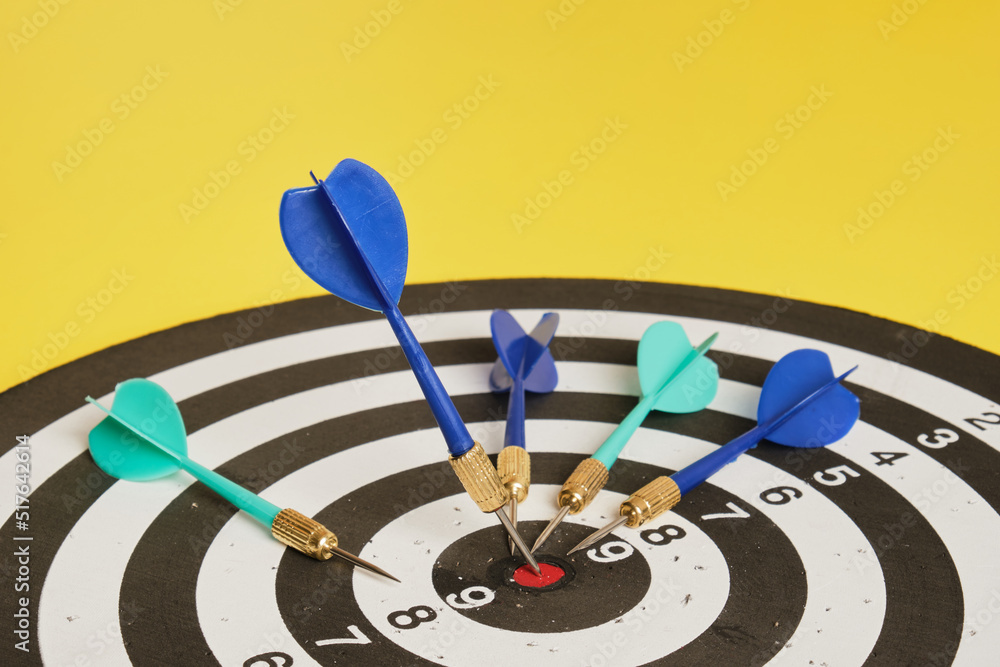 dart in a lined board for playing darts dart in a lined board for playing darts