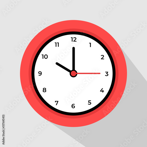 vector illustration of a red wall clock showing 10 o'clock photo