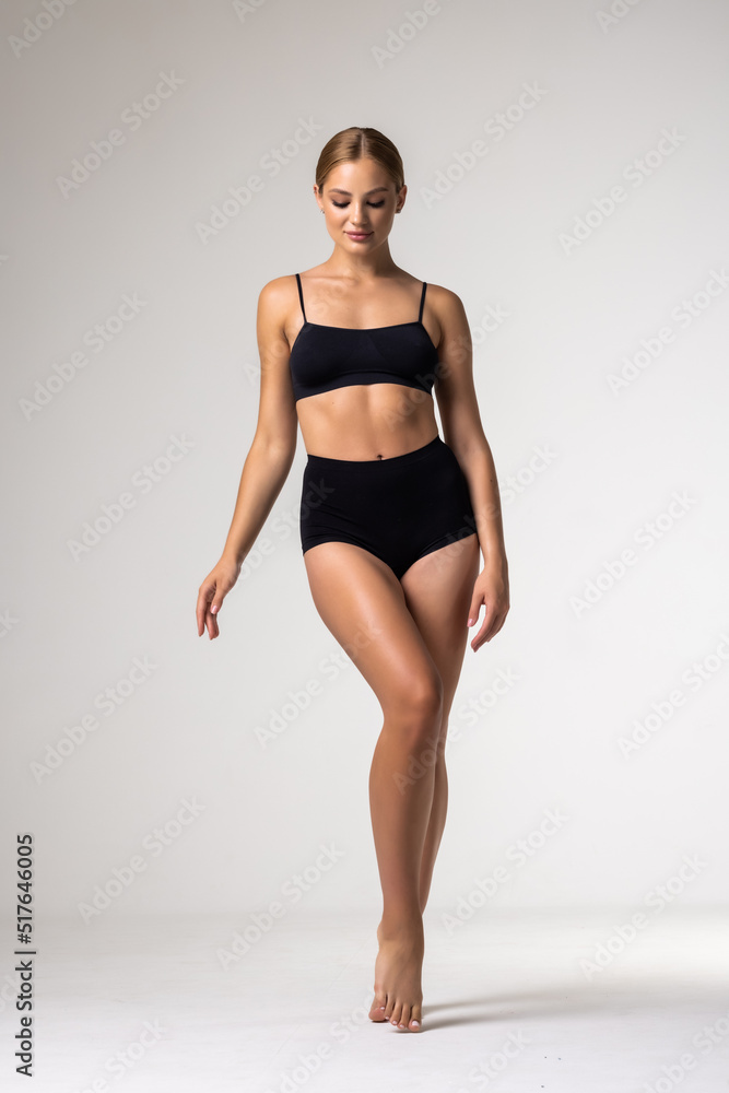 Young teen woman in black lingerie Stock Photo
