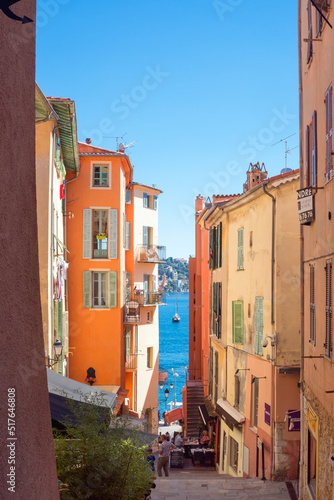 Villefranche-sur-Mer, France, September 2021. Old narrow authentic street of the city of Villefranche-sur-Mer in the French Riviera resort. Journey along the Cote d'Azur. photo