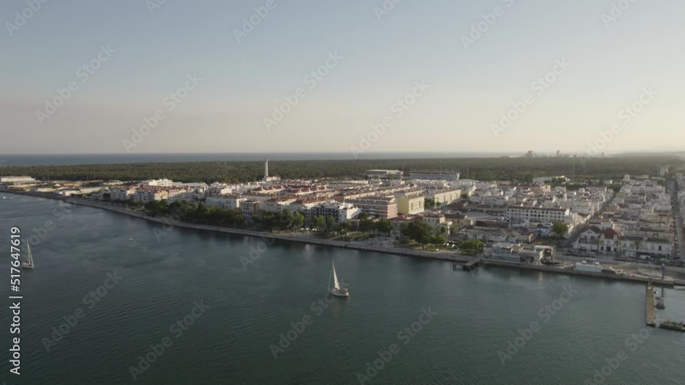 Aerial Over The Guadiana River With Boats Sailing Beside Vila Real de Santo Antonio. Dolly Forward, Pan Left Aerial Over The Guadiana River With Boats Sailing Beside Vila Real de Santo Antonio. Dolly Forward, Pan Left