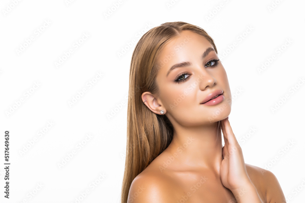 Beauty portrait of a smiling woman looking at camera isolated on a white background Beauty portrait of a smiling woman looking at camera isolated on a white background