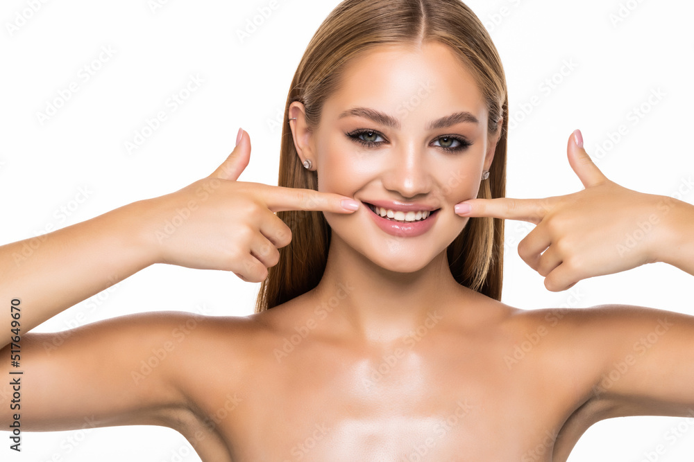 Beautiful surprised woman pointed on perfect smile on white background Beautiful surprised woman pointed on perfect smile on white background