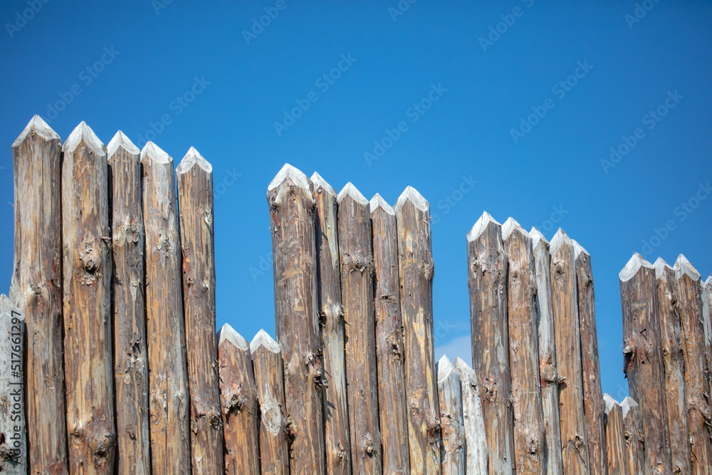 Wooden fence against the sky. Wooden fence against the sky.