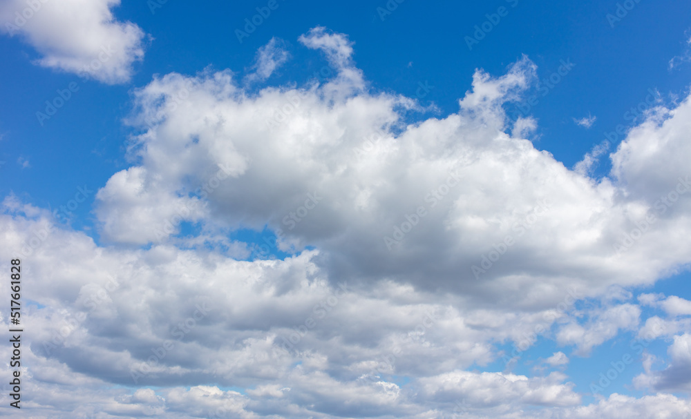 White clouds against the blue sky. White clouds against the blue sky.