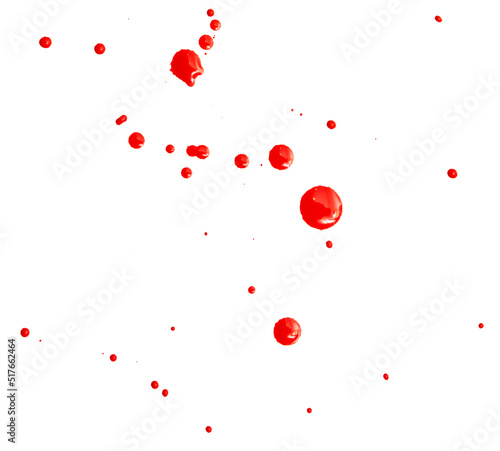 Drops of red paint on a white background.