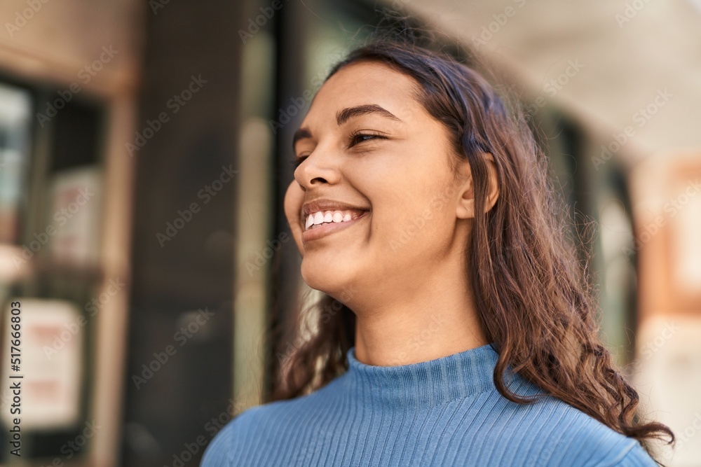 Young african american woman smiling confident standing at street Young african american woman smiling confident standing at street