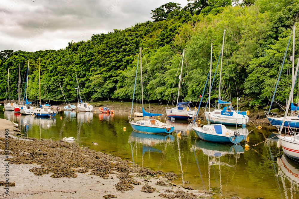 Cramond, Scotland, UK – June 21 2022. Yachts, pleasure craft and leisure boats moored on the River Almond at low tide