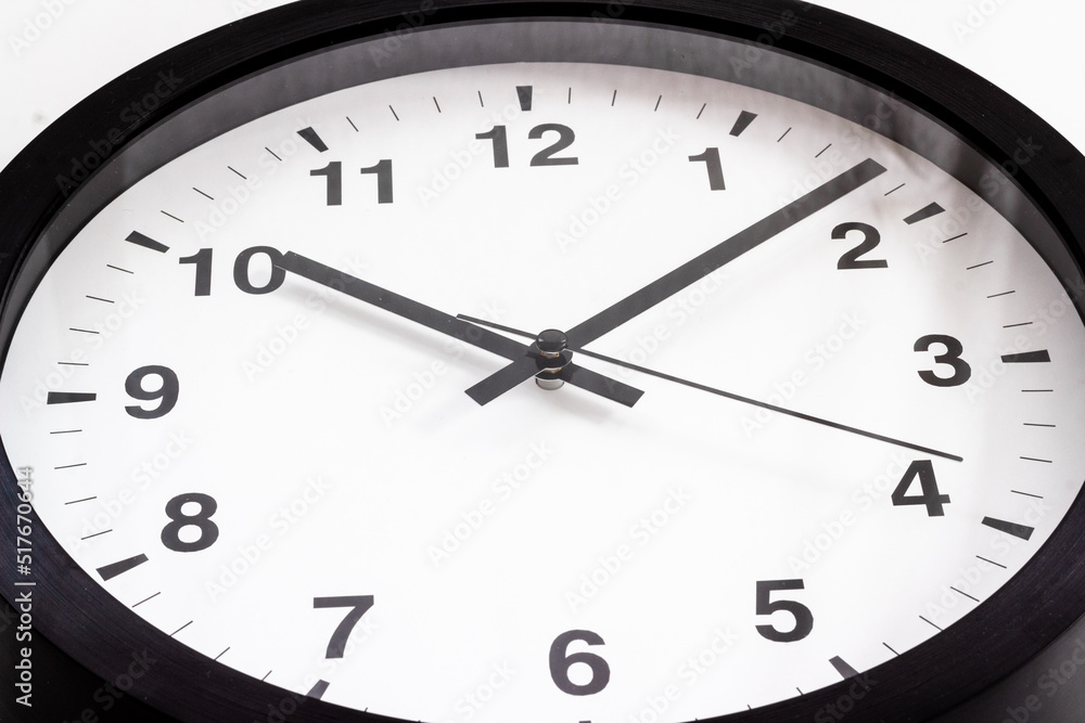 Office wall clock. Black and white clock - time to work concept Office wall clock. Black and white clock - time to work concept