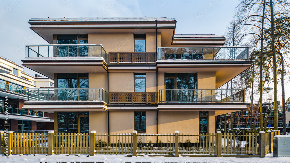 Modern facade of new luxury residential building at winter. Modern facade of new luxury residential building at winter.
