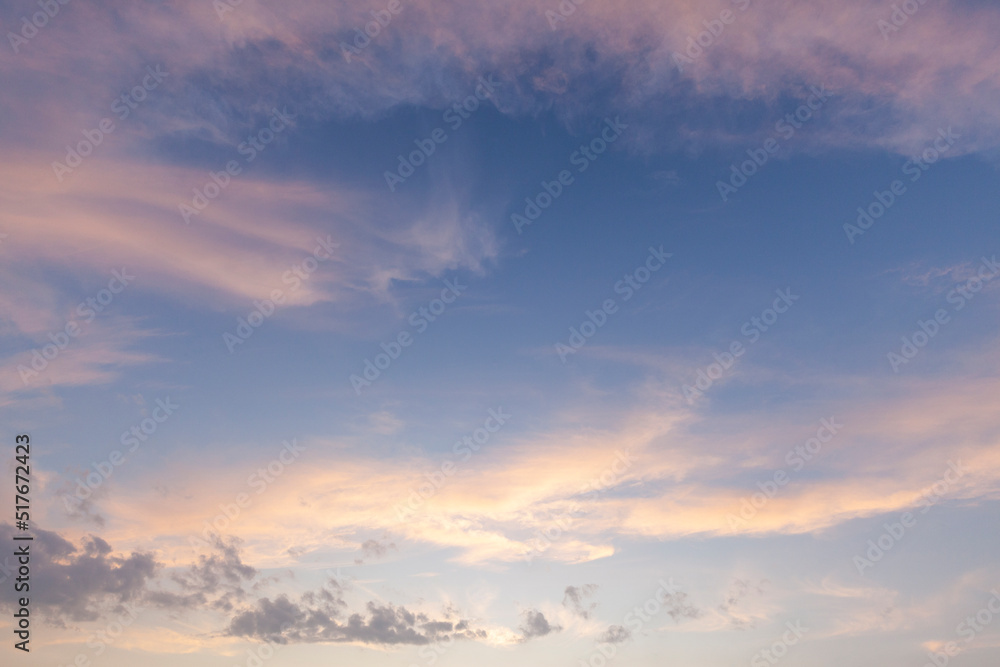 Amazing wispy sunset sky with pink clouds in spring in Norfolk England. Cloudscape scene with no people Amazing wispy sunset sky with pink clouds in spring in Norfolk England. Cloudscape scene with no people