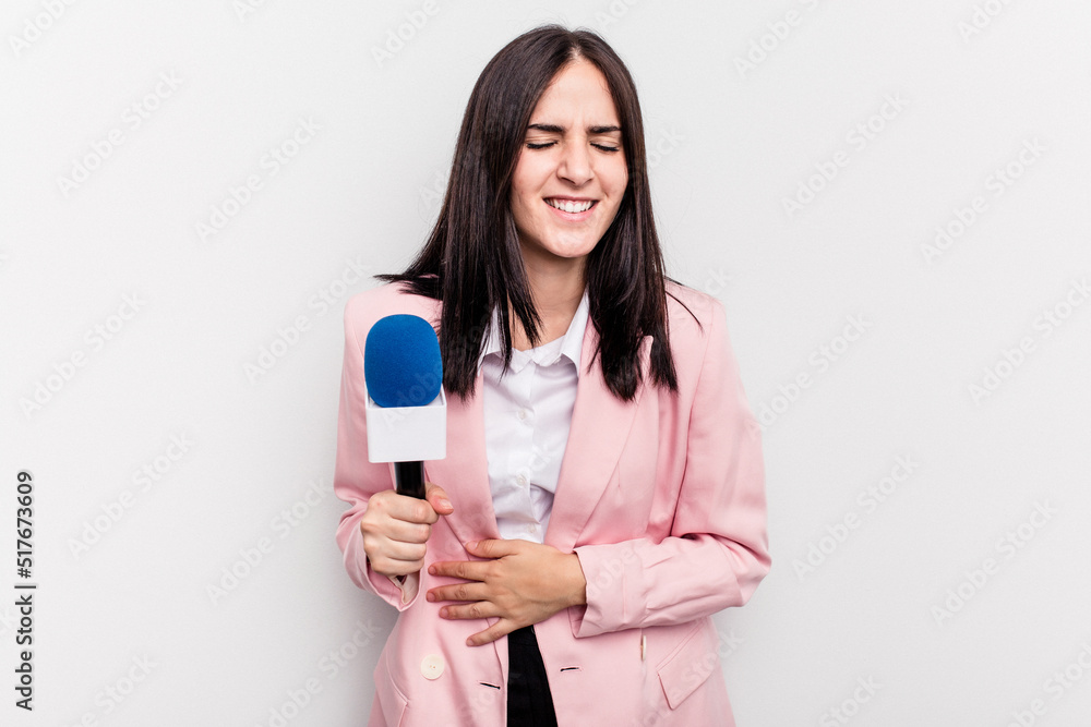 Young TV presenter caucasian woman isolated on white background laughing and having fun. Young TV presenter caucasian woman isolated on white background laughing and having fun.