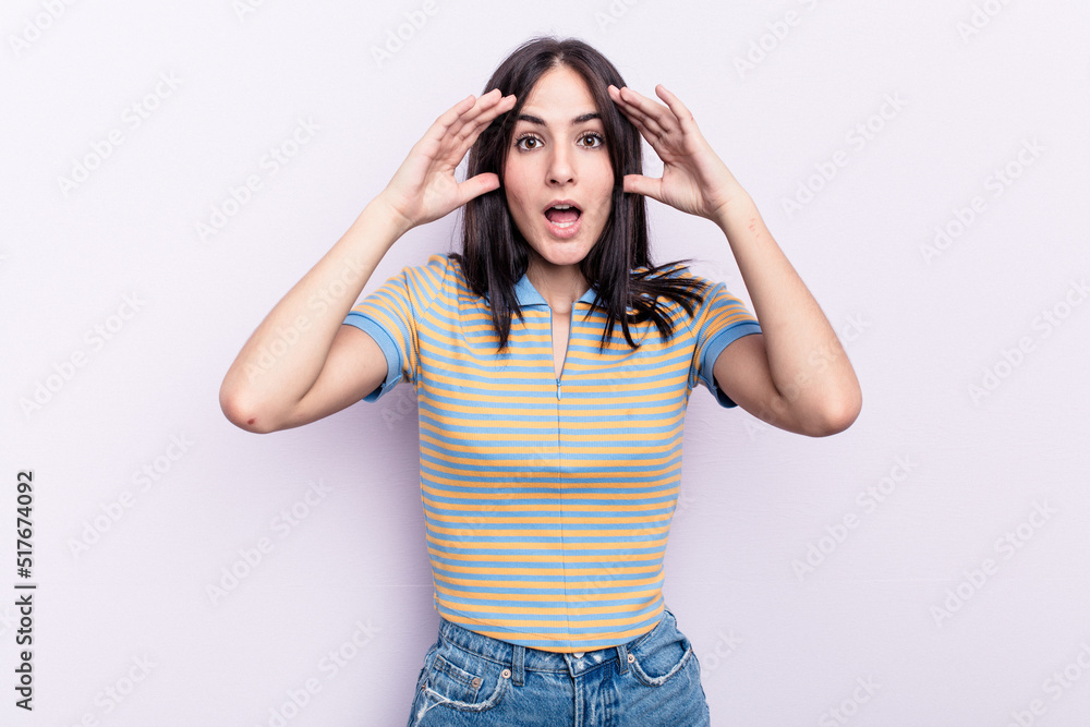 Young caucasian woman isolated on pink background receiving a pleasant surprise, excited and raising hands. Young caucasian woman isolated on pink background receiving a pleasant surprise, excited and raising hands.