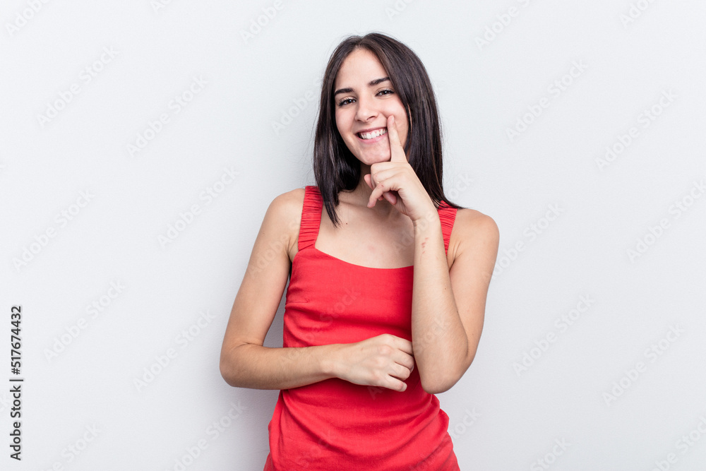 Young caucasian woman isolated on white background smiling happy and confident, touching chin with hand. Young caucasian woman isolated on white background smiling happy and confident, touching chin with hand.