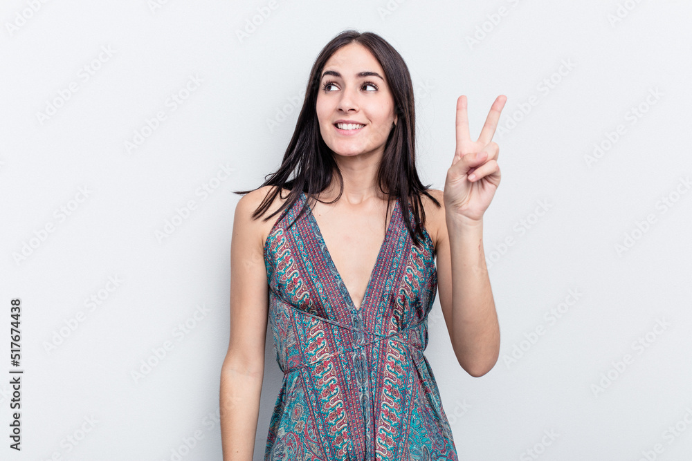 Young caucasian woman isolated on white background showing number two with fingers. Young caucasian woman isolated on white background showing number two with fingers.