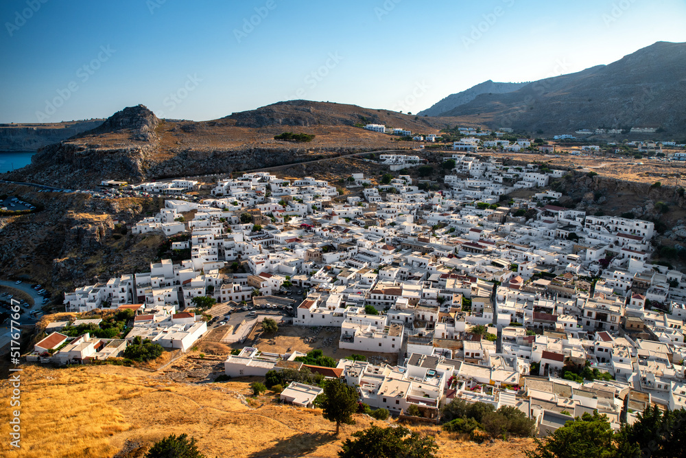 Traditional greek white buildings in town Lindos at Rhodes island in Greece