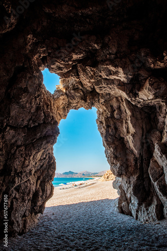 Fototapeta Naklejka Na Ścianę i Meble -  Rock cave on the Traganou beach in Rhodes island, Greece
