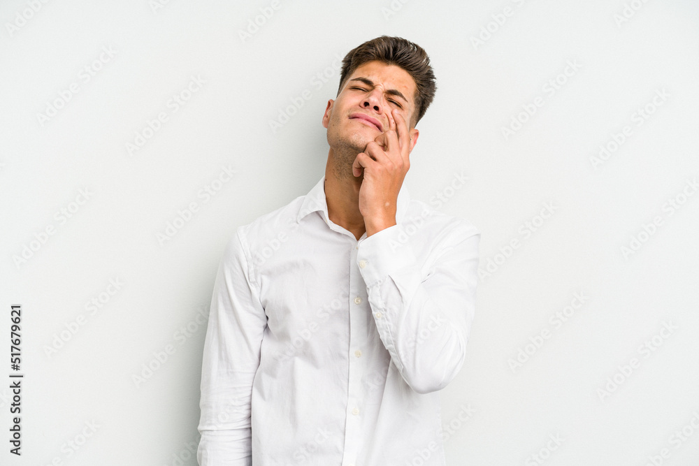 Young caucasian man isolated on white background crying, unhappy with something, agony and confusion concept. Young caucasian man isolated on white background crying, unhappy with something, agony and confusion concept.