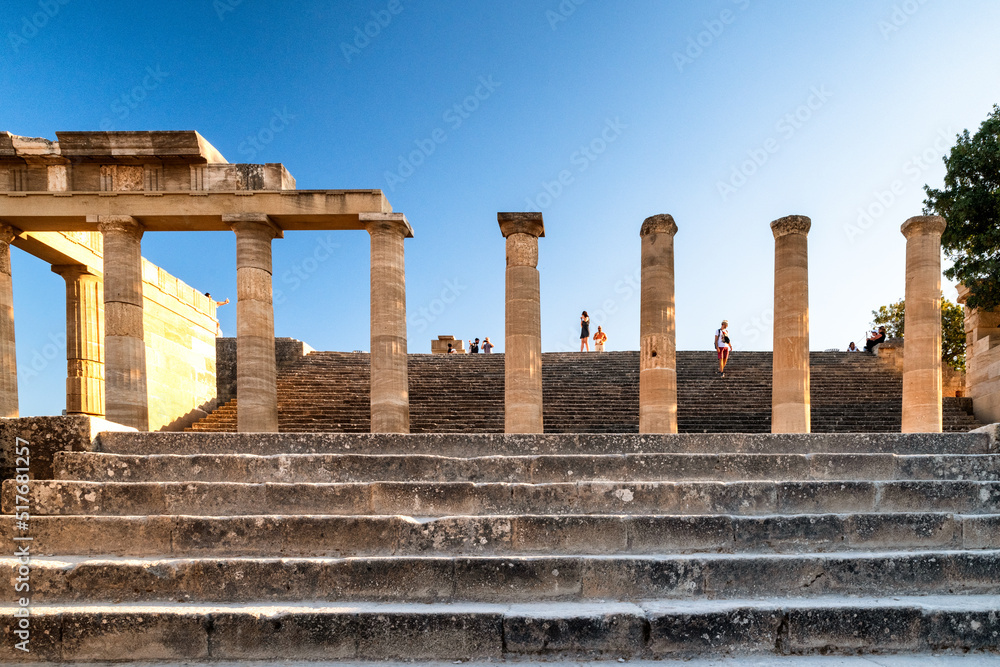 Fototapeta premium Tourists in Lindos acropolis at Rhodes island in Greece