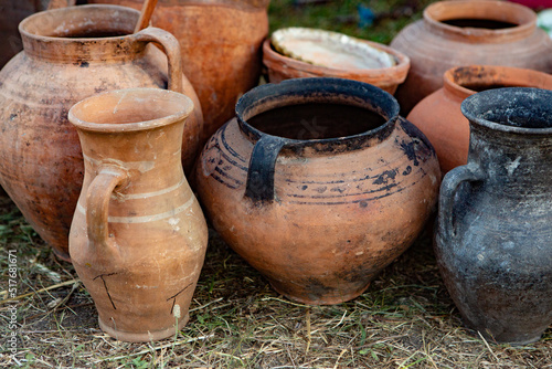 Traditional old clay pots from Moldova or Romania photo