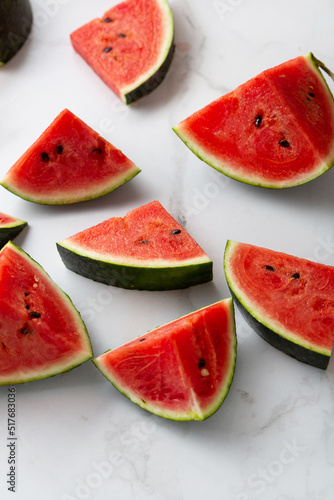 Green watermelon  sliced pieces summer concept top view summer food