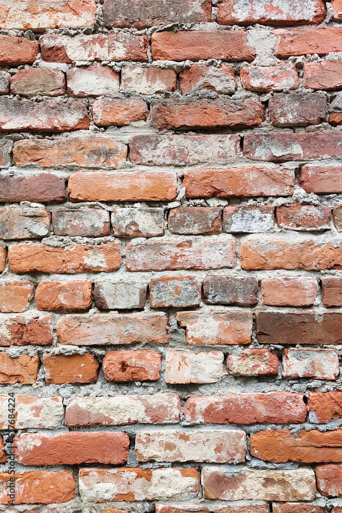Red old brick wall. Shabby and peeling. Red old brick wall. Shabby and peeling.
