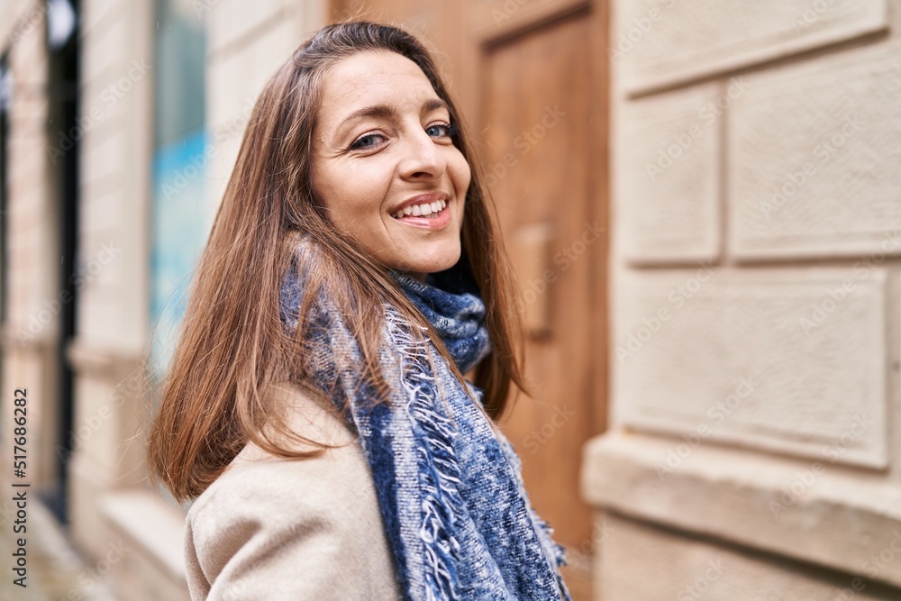 Young woman smiling confident standing at street Young woman smiling confident standing at street