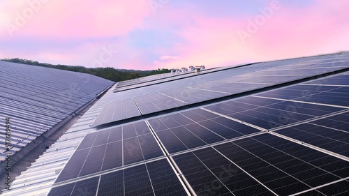 Photovoltaic solar panels mounted on building roof for producing clean ecological electricity at sunset. Production of renewable energy concept.
