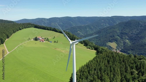 Aerial video of wind power plant on the hilltop between fir trees. St. Peter, Black forest, Germany.
Concept  for regenerative energy and energy crisis.