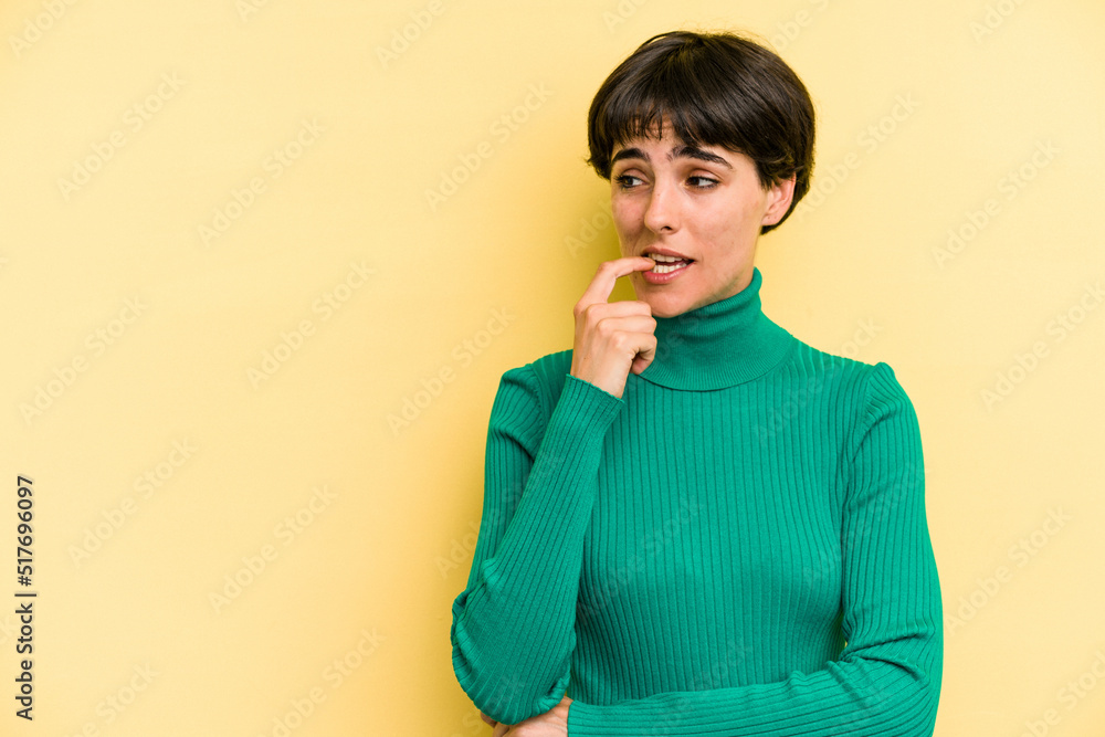Young caucasian woman with a short hair cut isolated looking sideways with doubtful and skeptical expression. Young caucasian woman with a short hair cut isolated looking sideways with doubtful and skeptical expression.