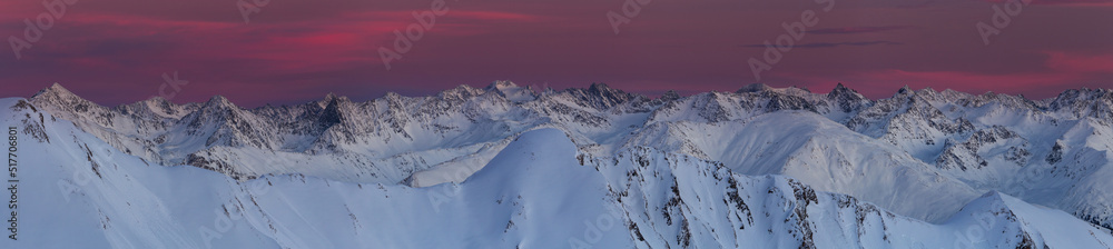Colorful sunset panorama of Alps at winter