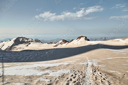 Climbing Kazbek, Georgia. trail to the summit. Nature of Caucasian mountains. Mount Kazbek alpinist expedition