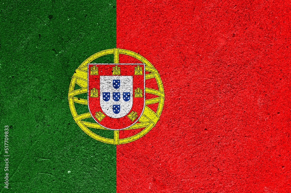 Fototapeta premium Flag of the Republic of Portugal on cement plaster