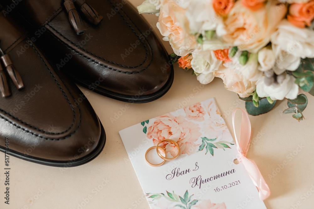 Naklejka premium wedding shoes on the table